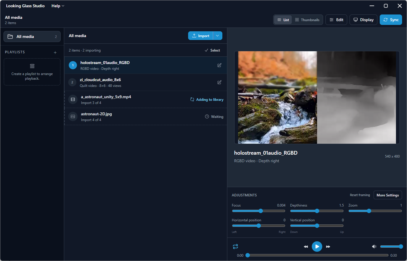 All media in List view with two imported videos, one file being added to the library, and a JPG waiting to import